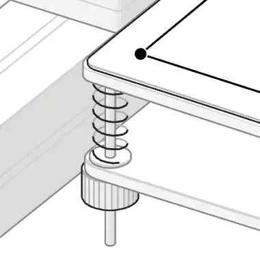 Close-up of a bed corner spring, screw and knurled knob