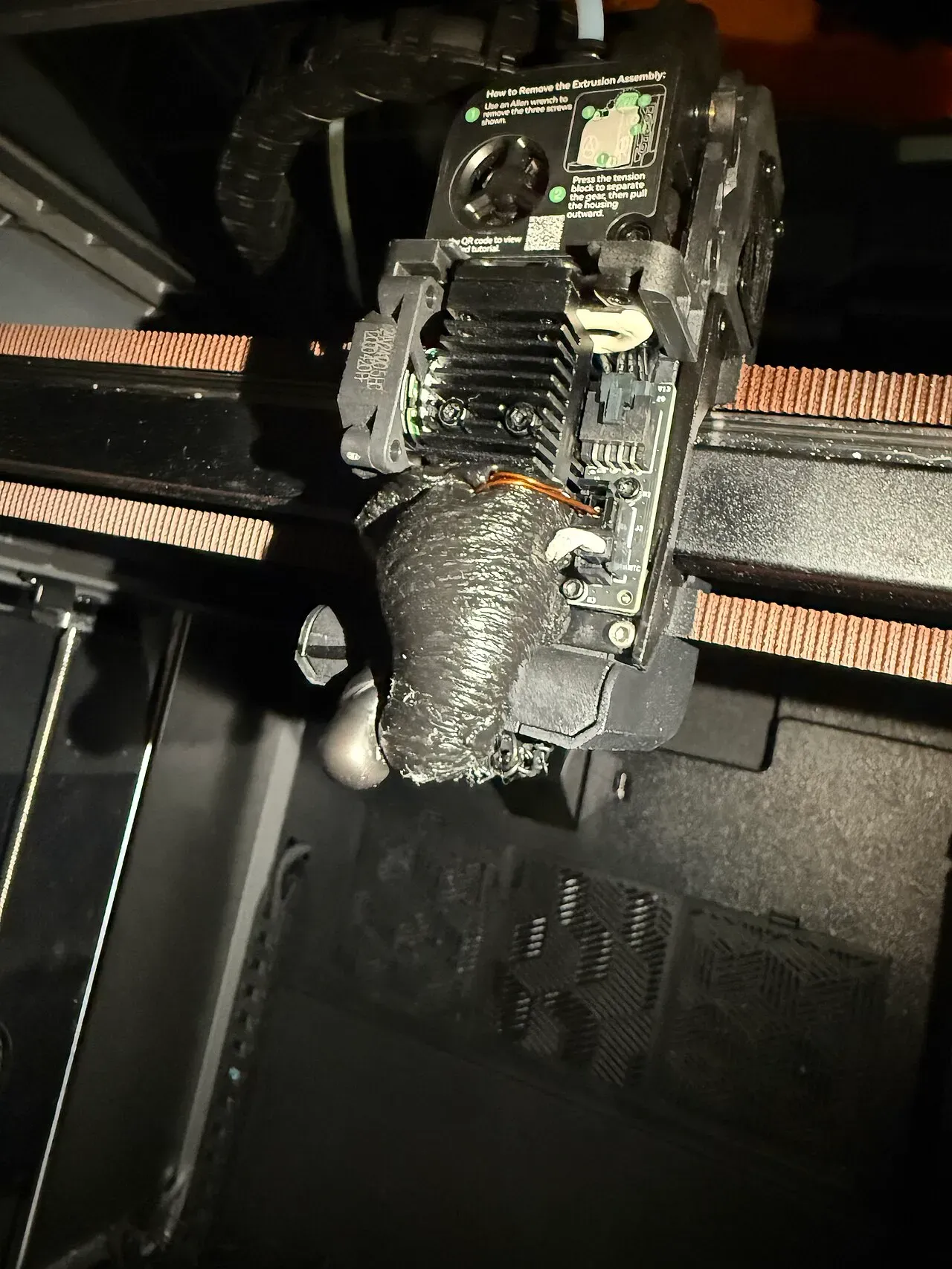 A hotend encased in a large blob of plastic