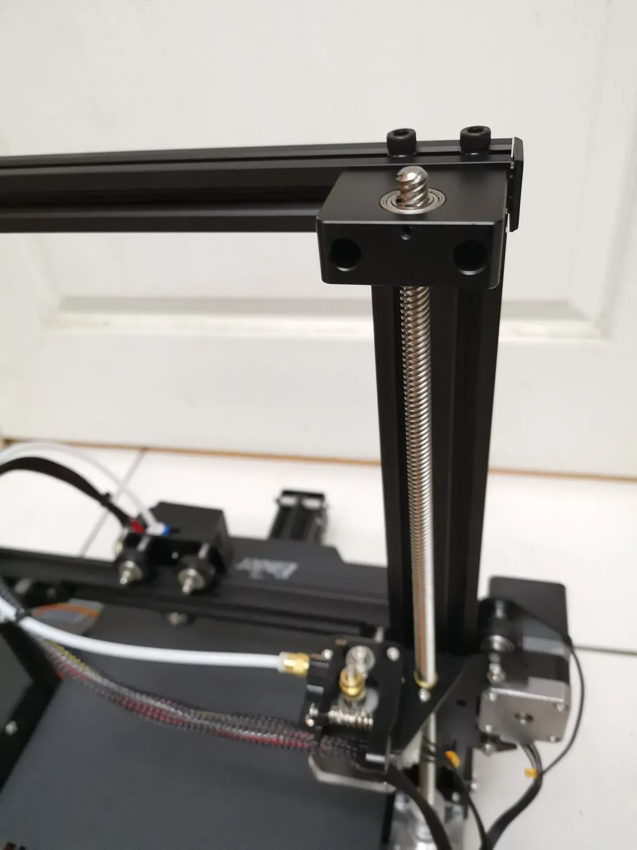Close-up of a Z axis lead screw on a printer frame