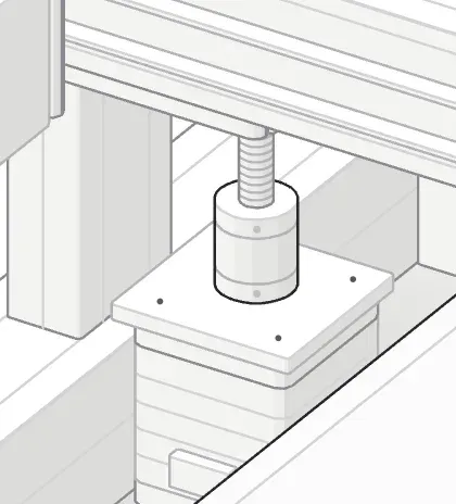 Close-up of a Z stepper motor coupler and lead screw