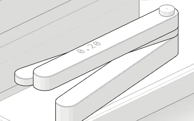 Close-up of a feeler gauge with a 0.20 mm leaf